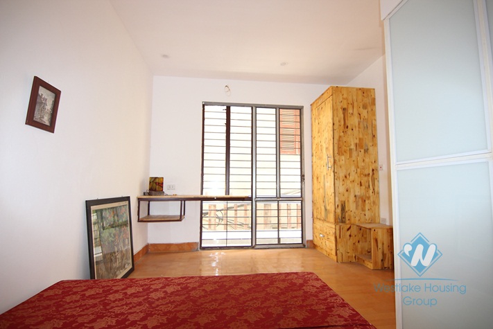 Tiny artisan's house with a balcony for rent in Tay Ho